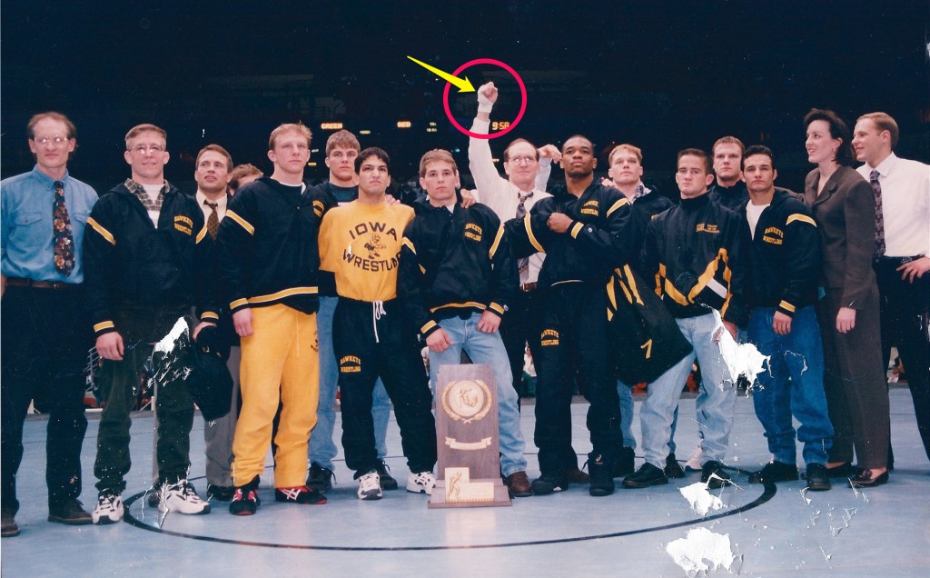 1996 NCAA Championship Team Photo circling hand tape